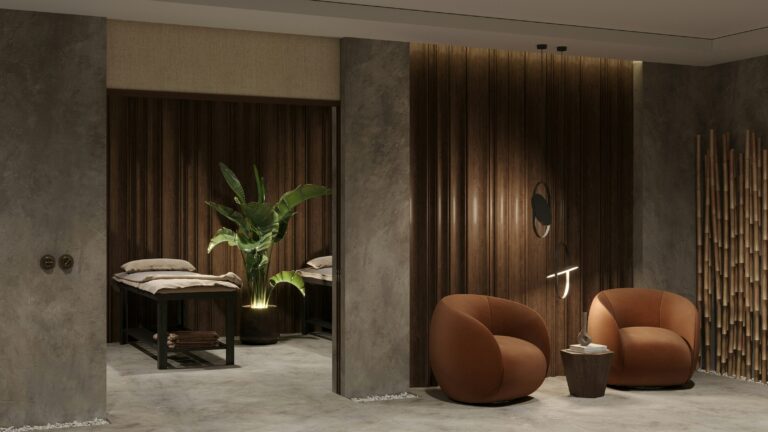 a-couple-of-chairs-sitting-next-to-each-other-in-a-massage and spa room